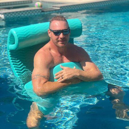 Brian Urlacher posed for a photo in his swimming pool at his house.